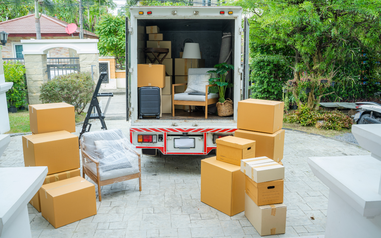 Professional packers wrapping boxes for a household move